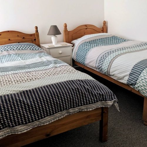 twin bedroom image of cape cottage accommodation.